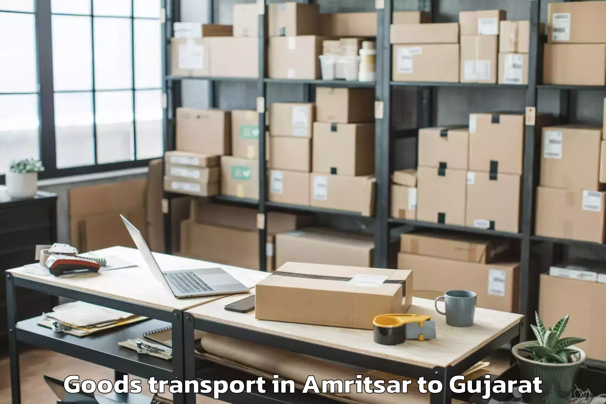 Book Your Amritsar to Kamdhenu University Gandhinaga Goods Transport Today